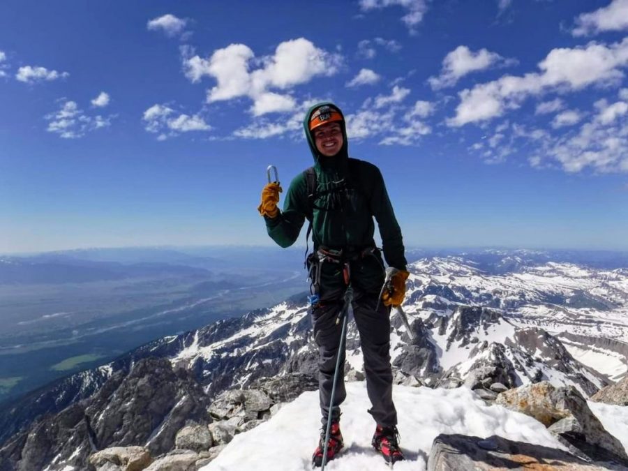 Heeren stands atop the Grand Tetons after a successful climb. He completed ascent 50 years after his grandfather accomplished the same feat.